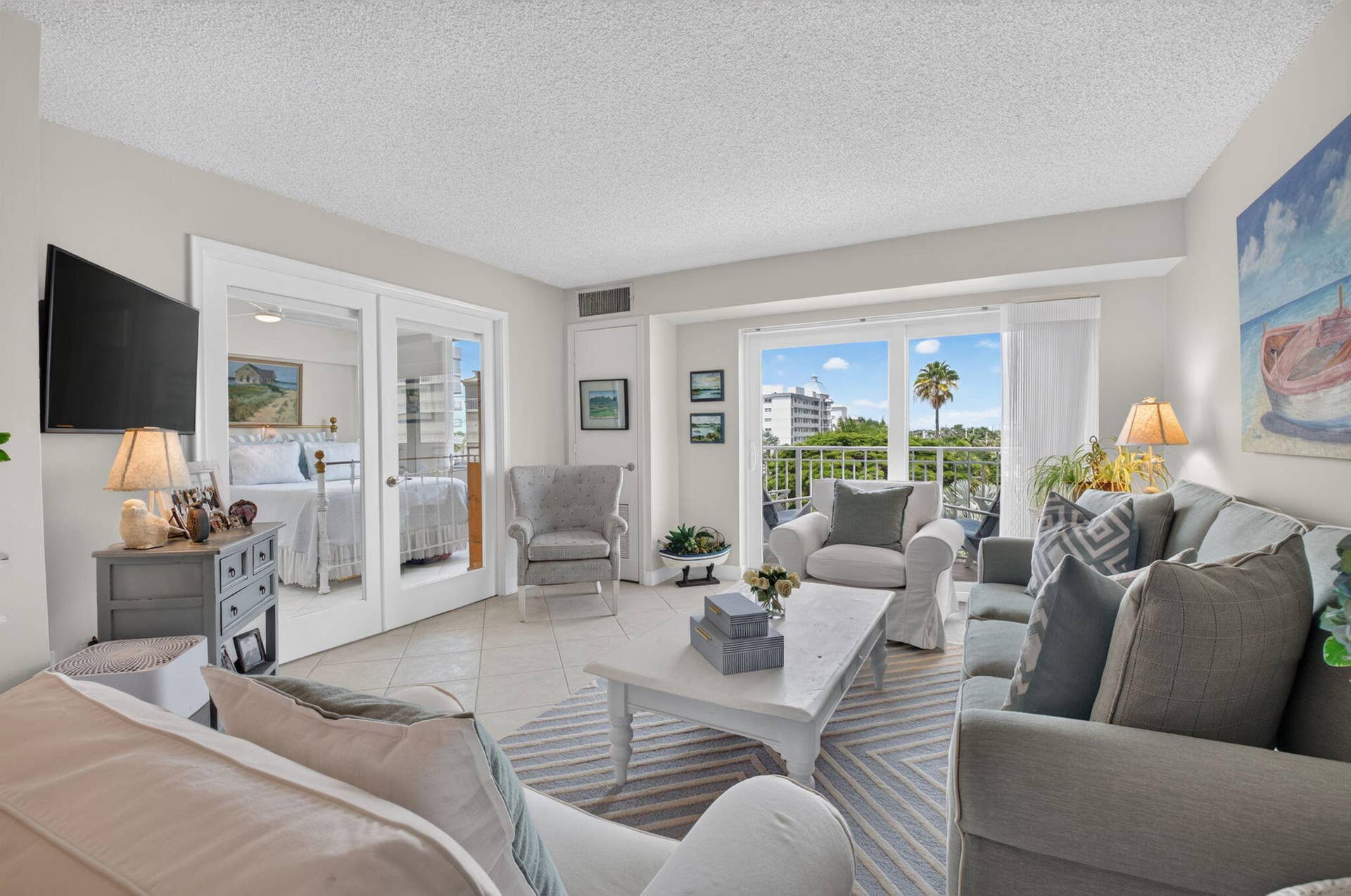 LIVING ROOM WITH BALCONY ACCESS