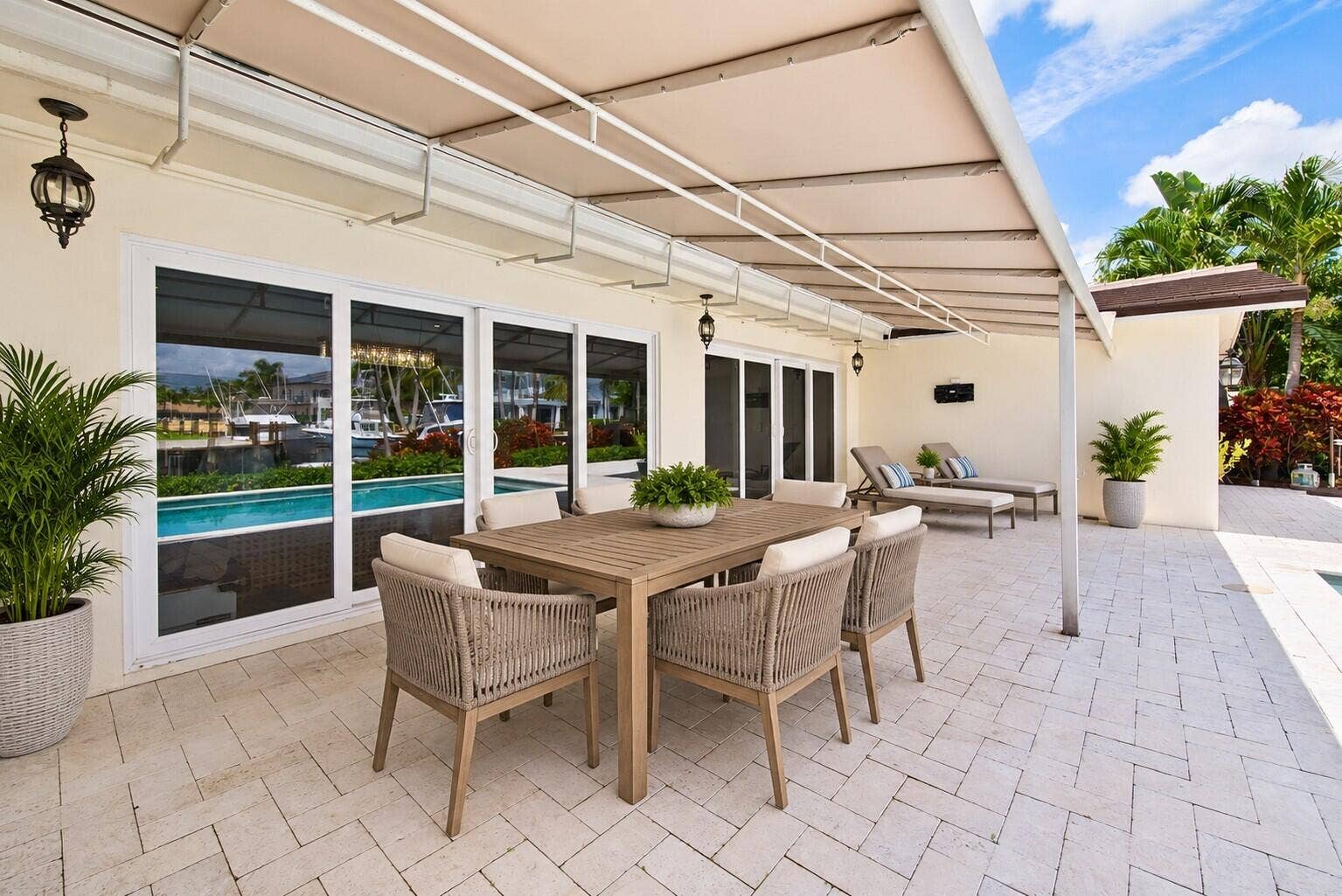 2401 NE 47TH Street, Lighthouse Point, Lighthouse Point, FL 33064 Stage back patio with table