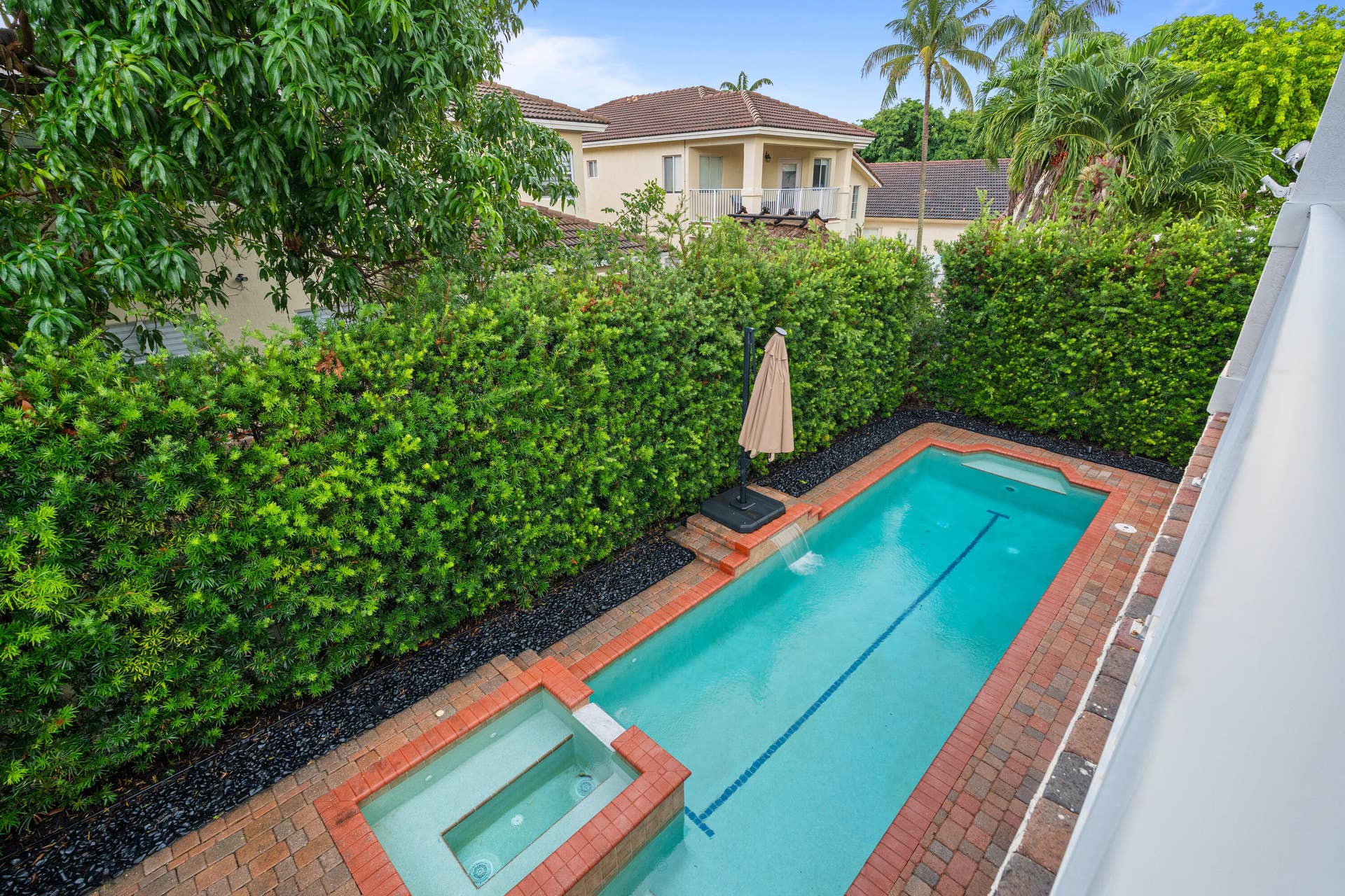7372 NW 18TH Court, Pembroke Pines, FL 33024 Balcony view down to pool off master bedroom