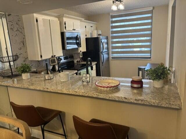 1707 WHITEHALL Drive, #105, Davie, FL 33324 alvarez18