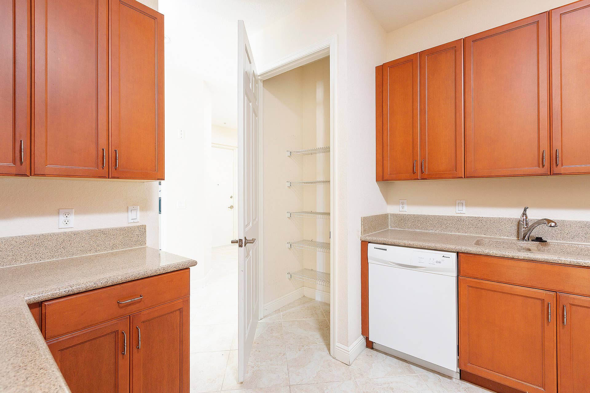 6807 LAKESIDE Circle N, #102-1, Davie, FL 33314 19_U2_Kitchen_Pantry