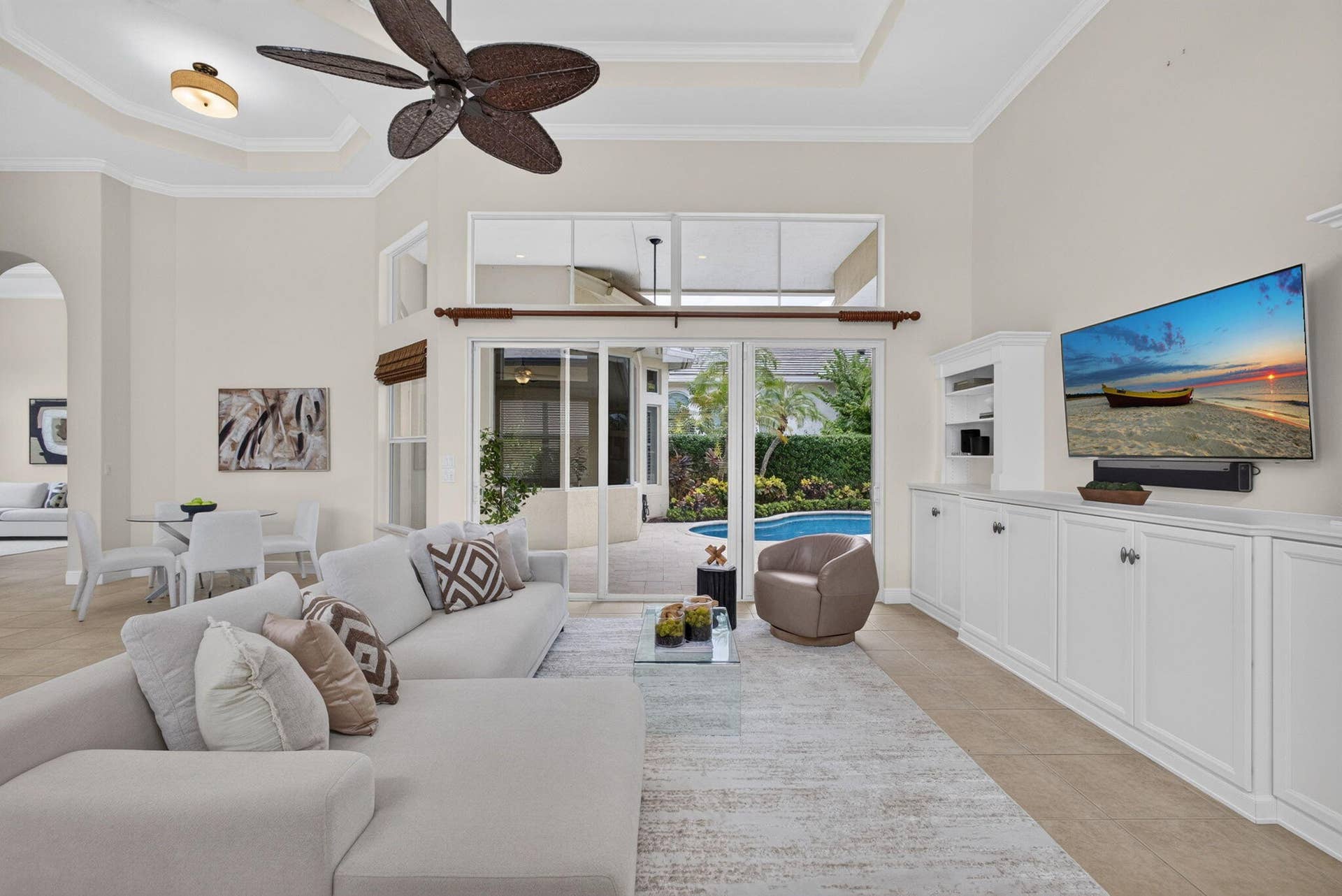540 Les Jardin Drive, Palm Beach Gardens, FL 33410 Large sliding doors in family room allow for lots of natural light
