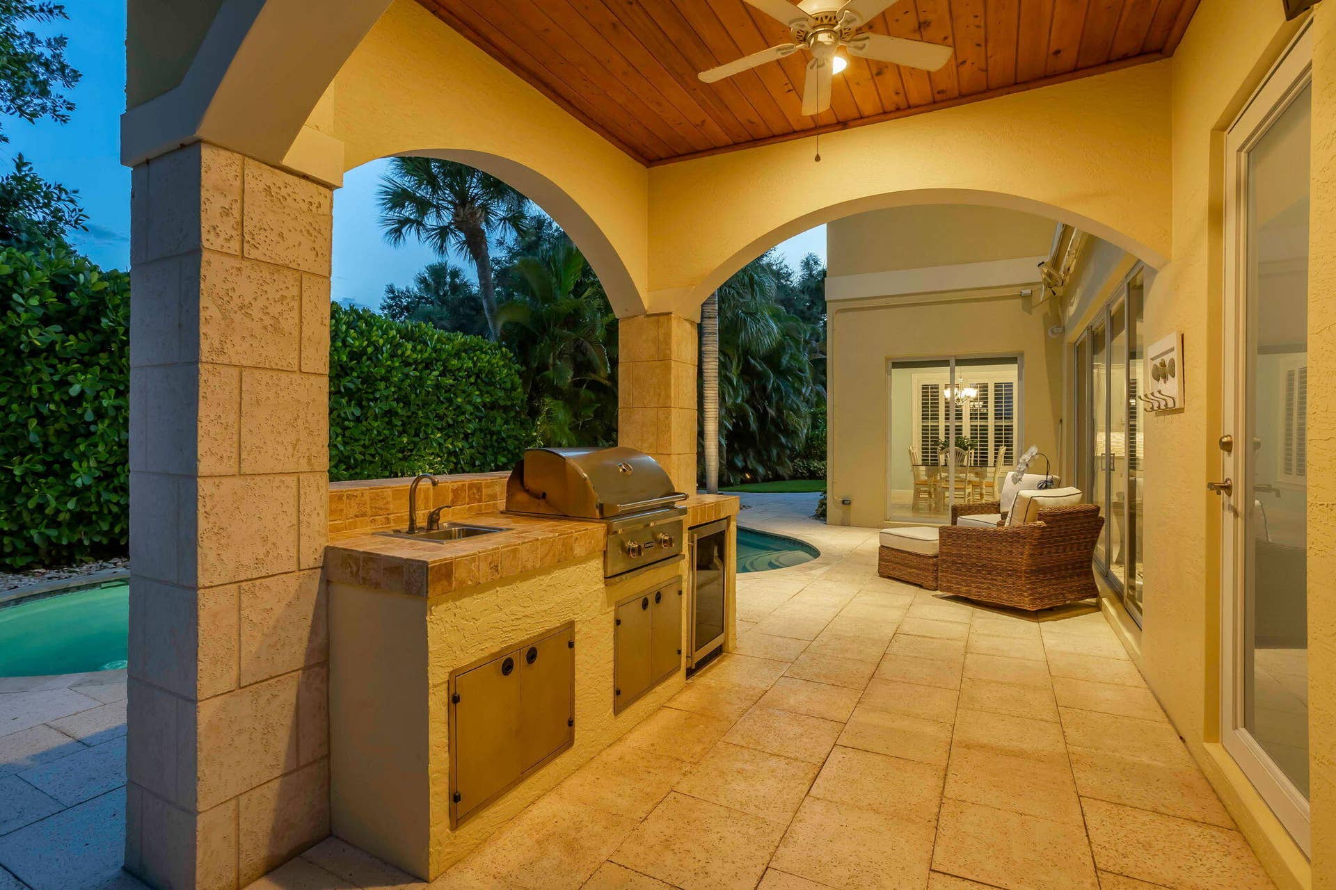 106 Nativa Circle, North Palm Beach, FL 33410 Twilight Outside Summer Kitchen