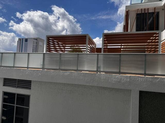 347 N New River Drive E, #1005, Fort Lauderdale, FL 33301 The view from the balcony looks into the amenity deck of the new building next door