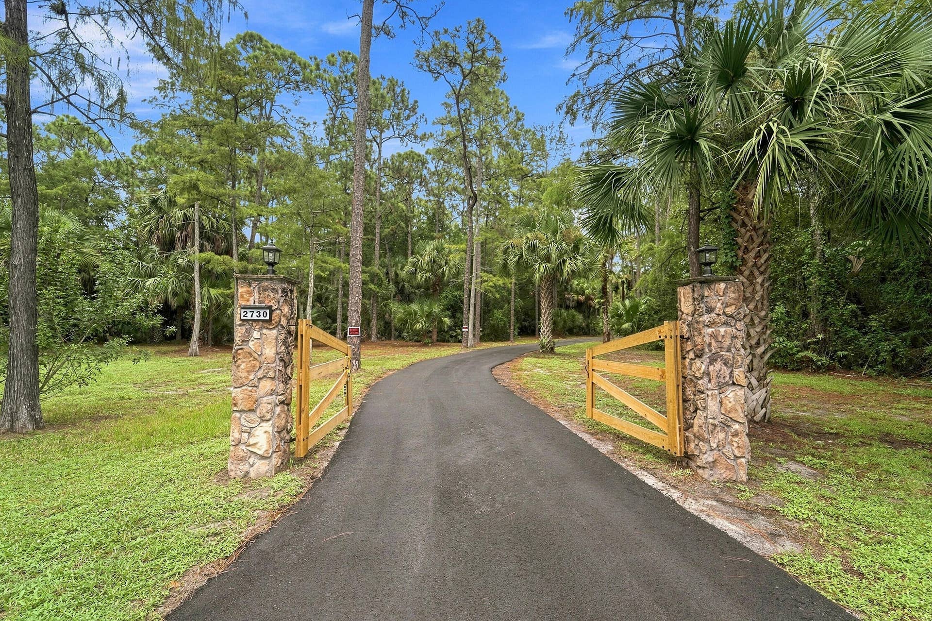 New Gates and Asphalt Driveway