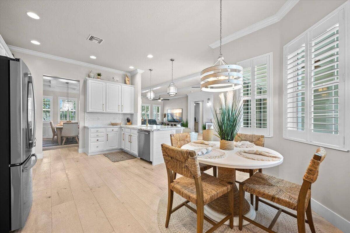1162 Tropical Drive, Jupiter, FL 33458 Seamless Kitchen-to-Dining Flow