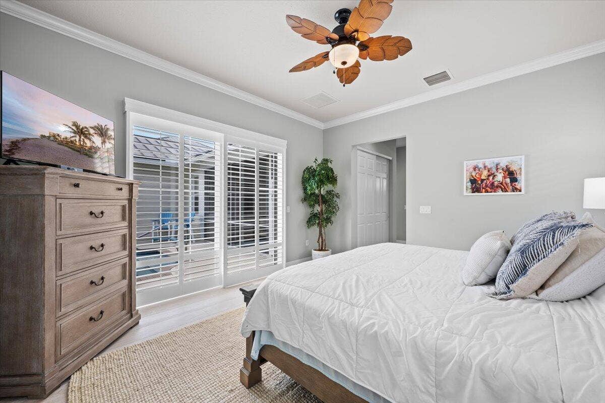 1162 Tropical Drive, Jupiter, FL 33458 Primary Bedroom Escape to Pool Patio