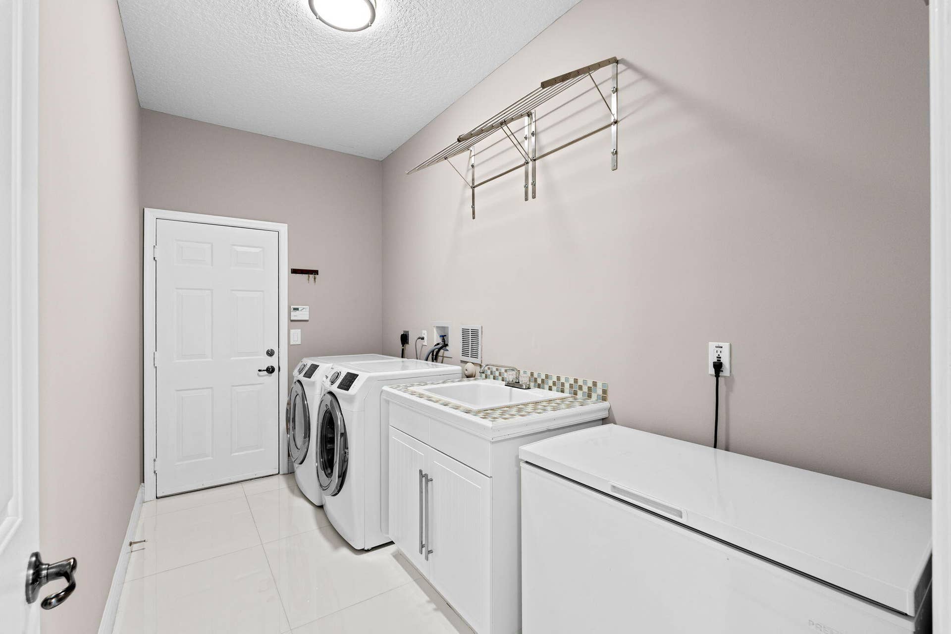 9919 Royal Cardigan Way, West Palm Beach, FL 33411 Laundry