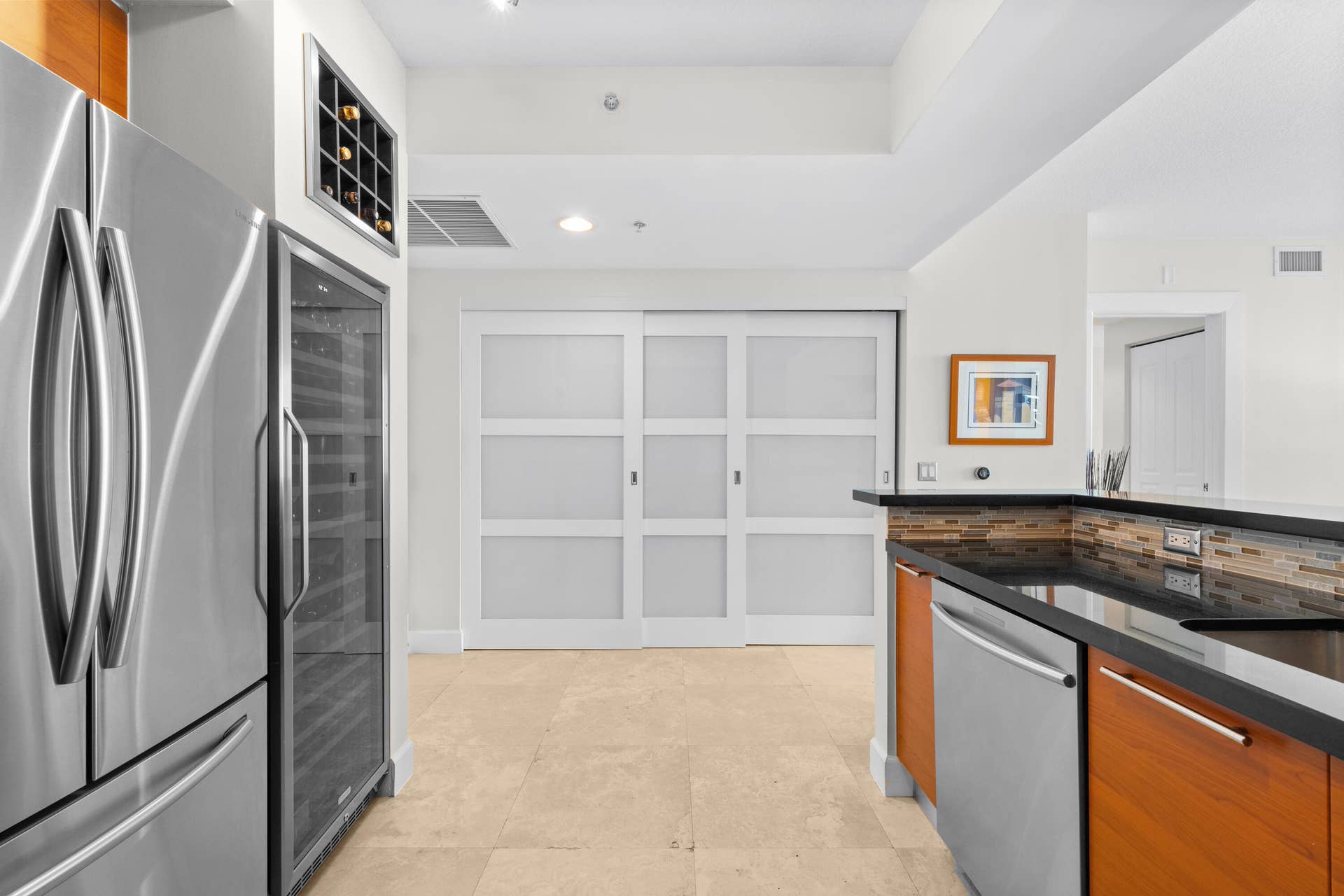350 SE 2ND Street, #2040, Fort Lauderdale, FL 33301 Kitchen & Laundry Closet behind sliding doors.