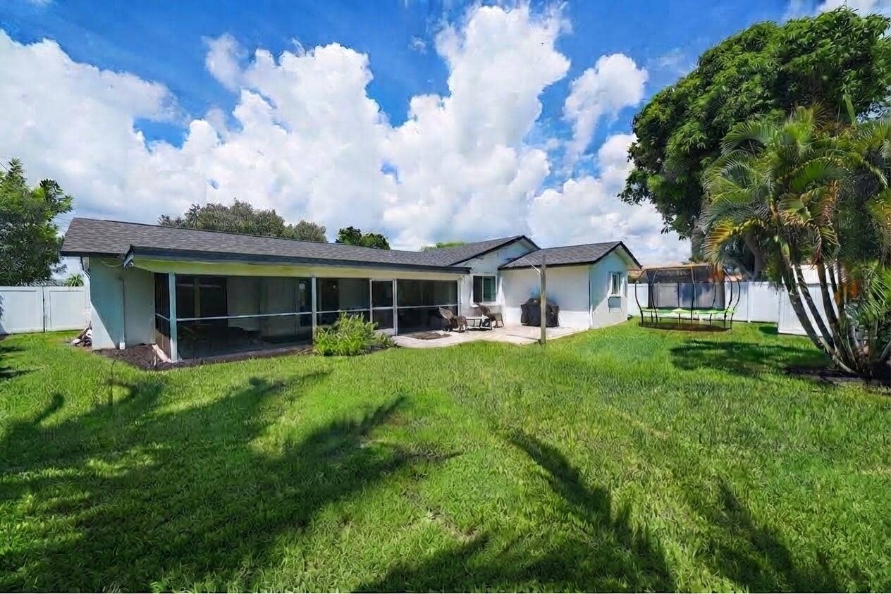 528 NW 15TH Avenue, Boca Raton, FL 33486 DOUBLE GATE ENTRY ON LEFT SIDE OF THE HOUSE