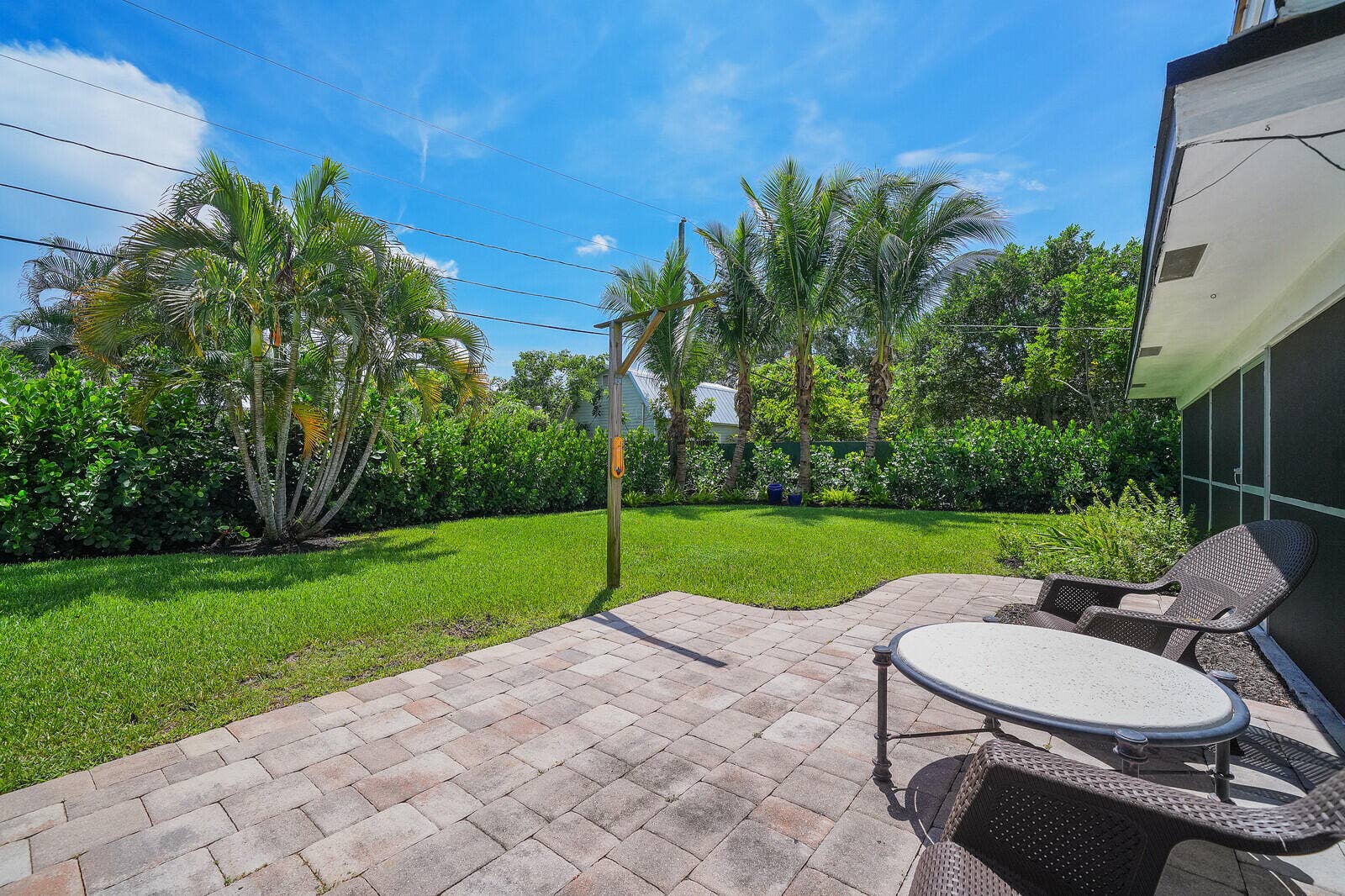 528 NW 15TH Avenue, Boca Raton, FL 33486 COMPLETELY FENCED IN WITH TROPICAL LANDSCAPING