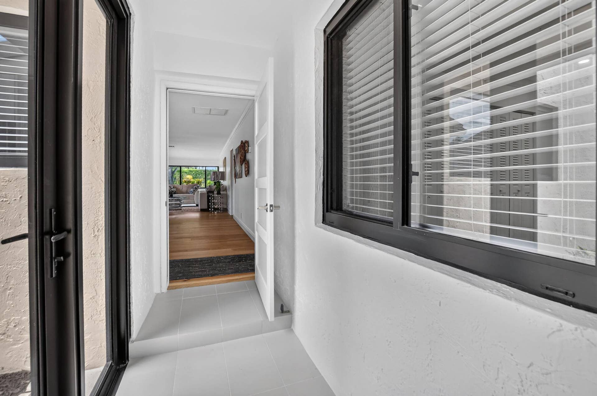 818 NW 26th Avenue, Delray Beach, FL 33445 Air conditioned Breezeway between house and garage.