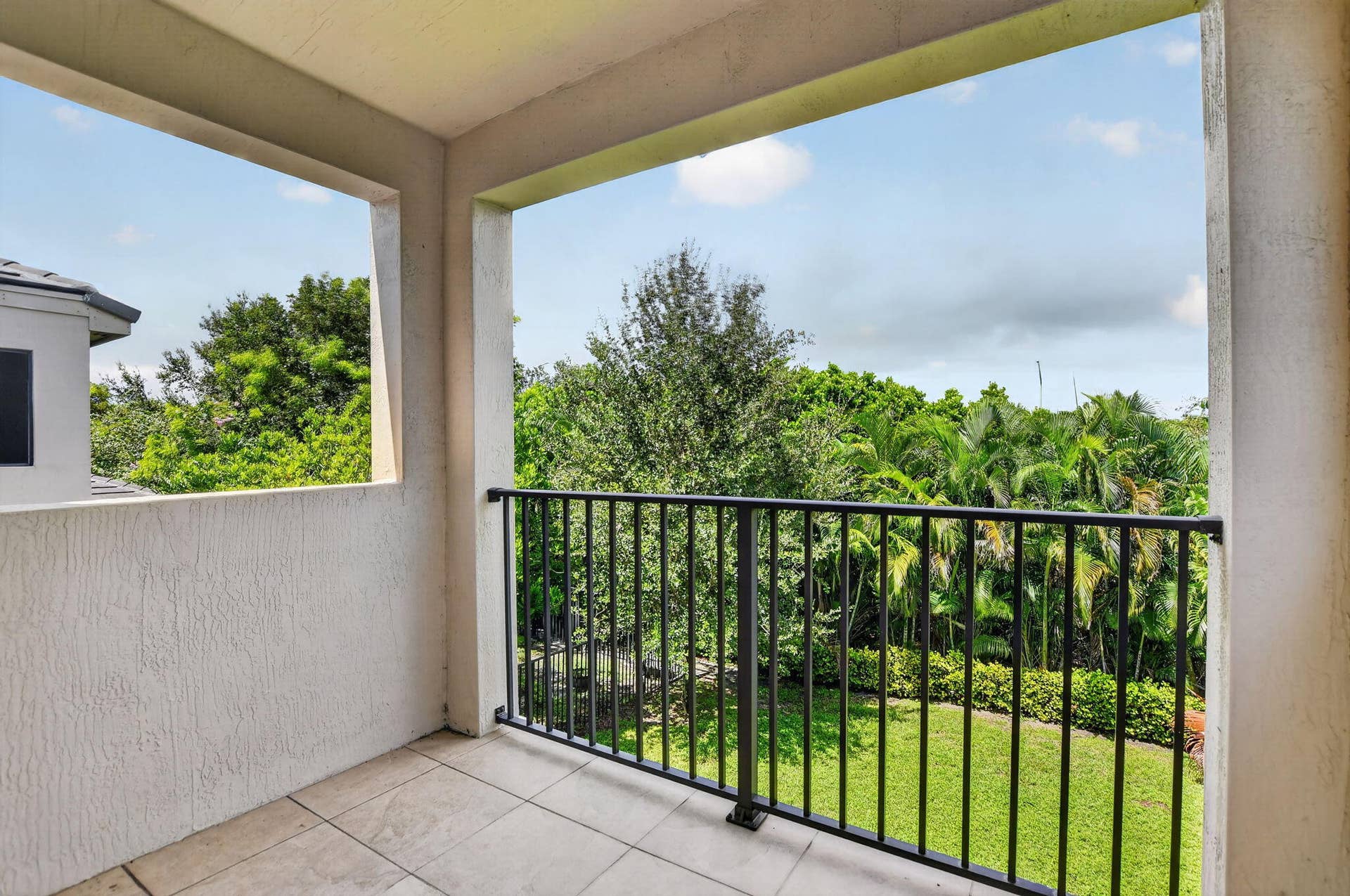 357 NW 36th Avenue, Pompano Beach, FL 33069 Balsoncy off primary BR overlooks the tropical yard.
