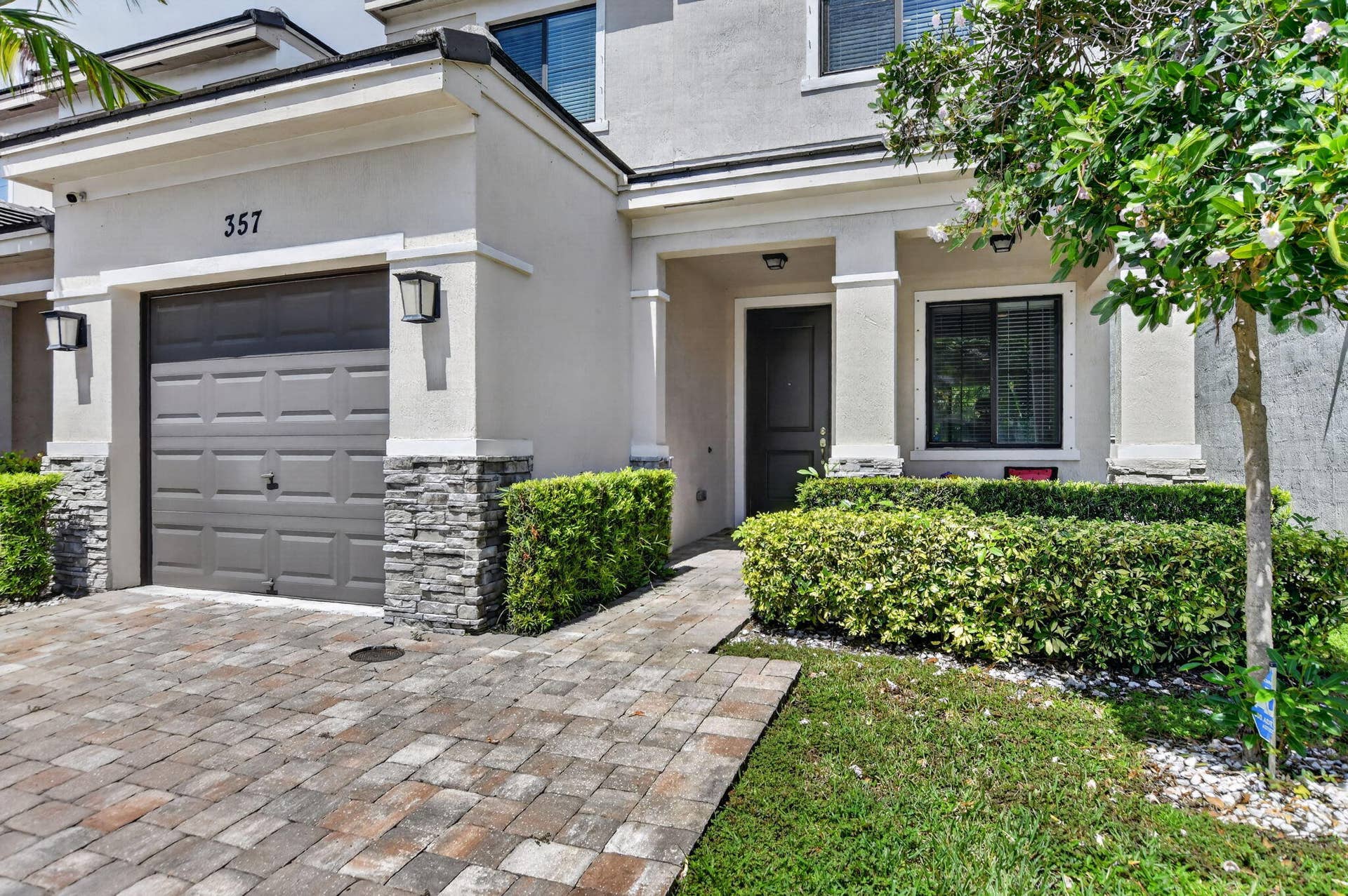 357 NW 36th Avenue, Pompano Beach, FL 33069 Move-in ready home with private, tropical rear yard for entertaining.