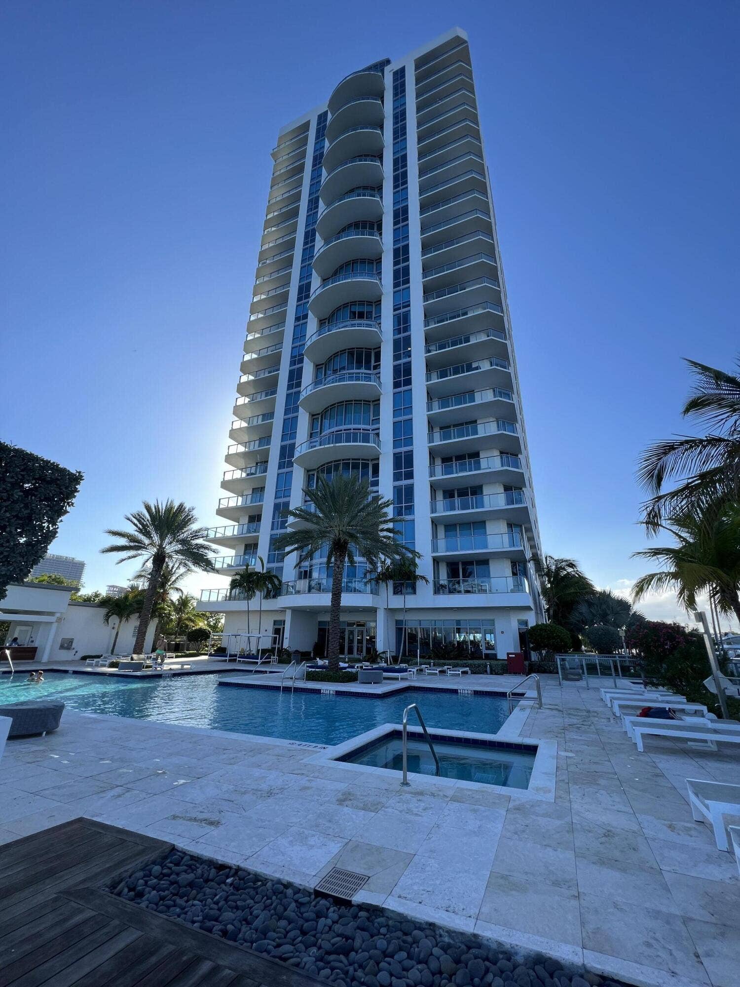 17111 BISCAYNE Boulevard, #1903, North Miami Beach, FL 33160 High-rise condominium with multiple private balconies, expansive pool deck, and integrated spa