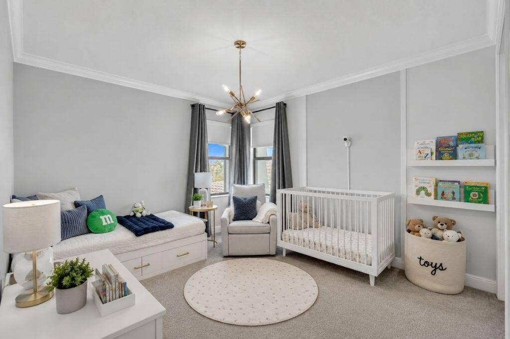 12143 S Baypoint Circle, Parkland, FL 33076 Room featuring light grey walls and crown molding