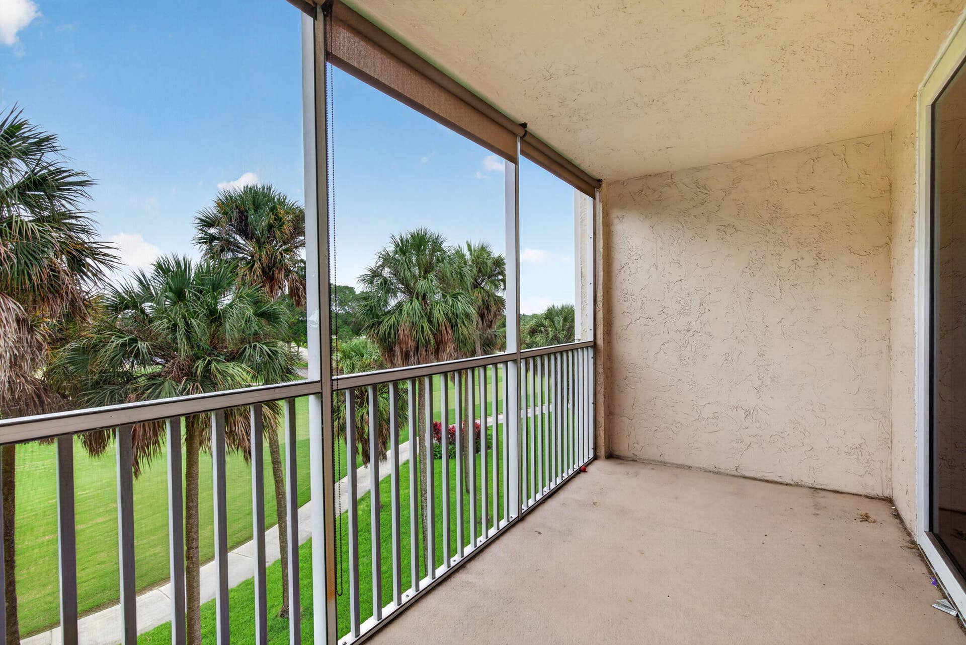 250 Jacaranda Drive, #411, Plantation, FL 33324 18 Screened Patio with view of golf cour