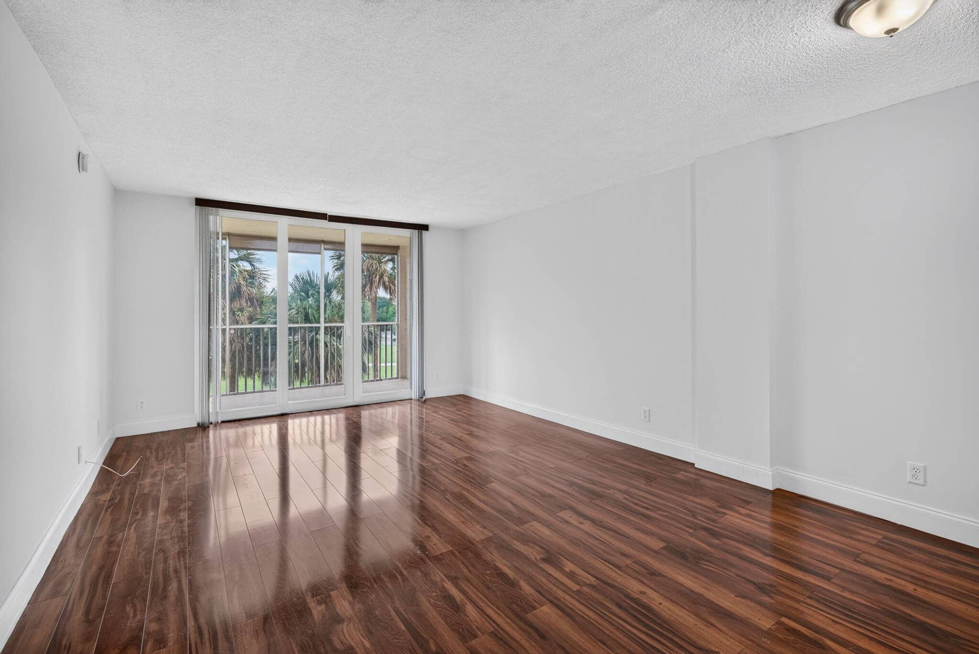 250 Jacaranda Drive, #411, Plantation, FL 33324 04 Living Room and Dining Room