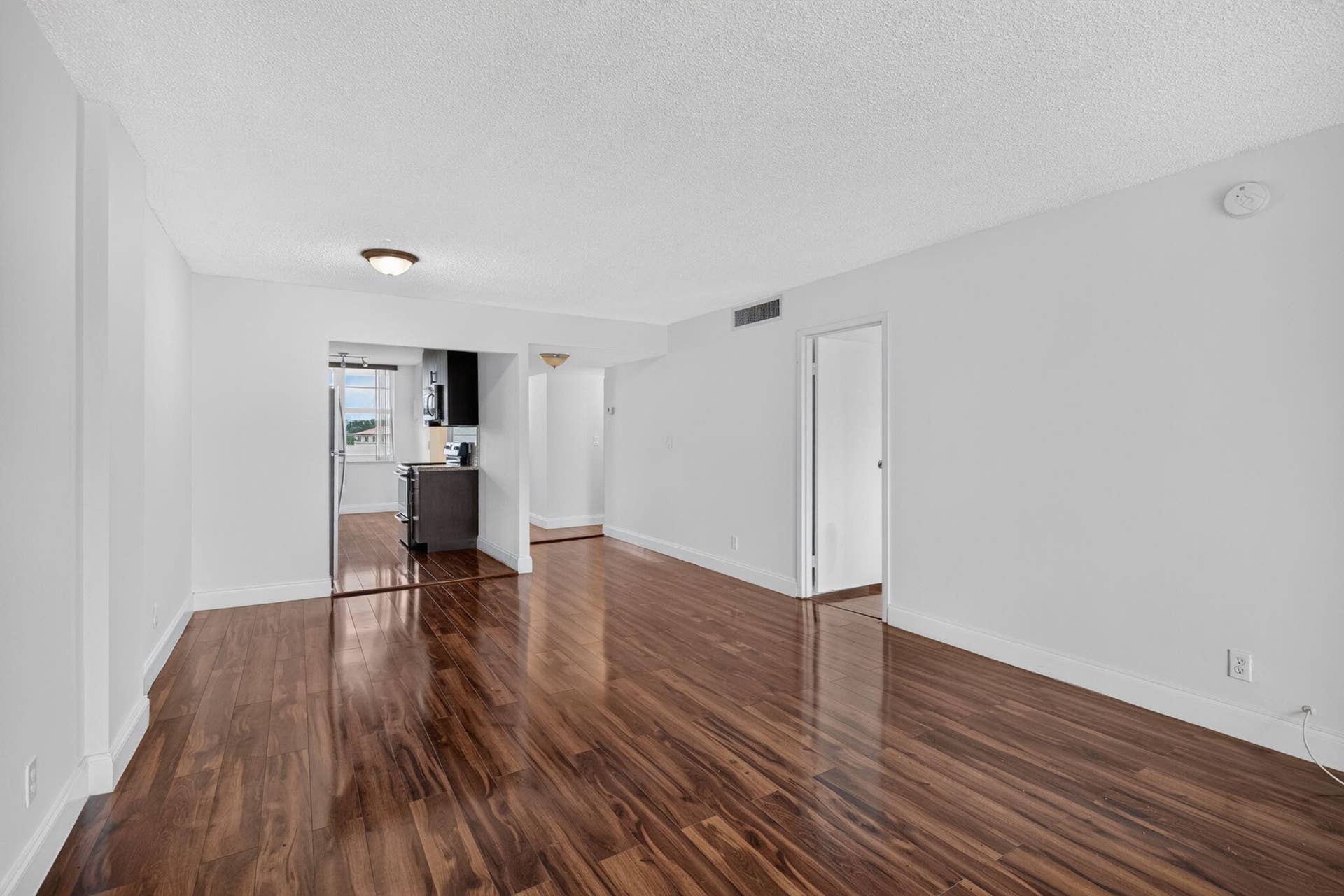 250 Jacaranda Drive, #411, Plantation, FL 33324 07 Living Room and Dining Room