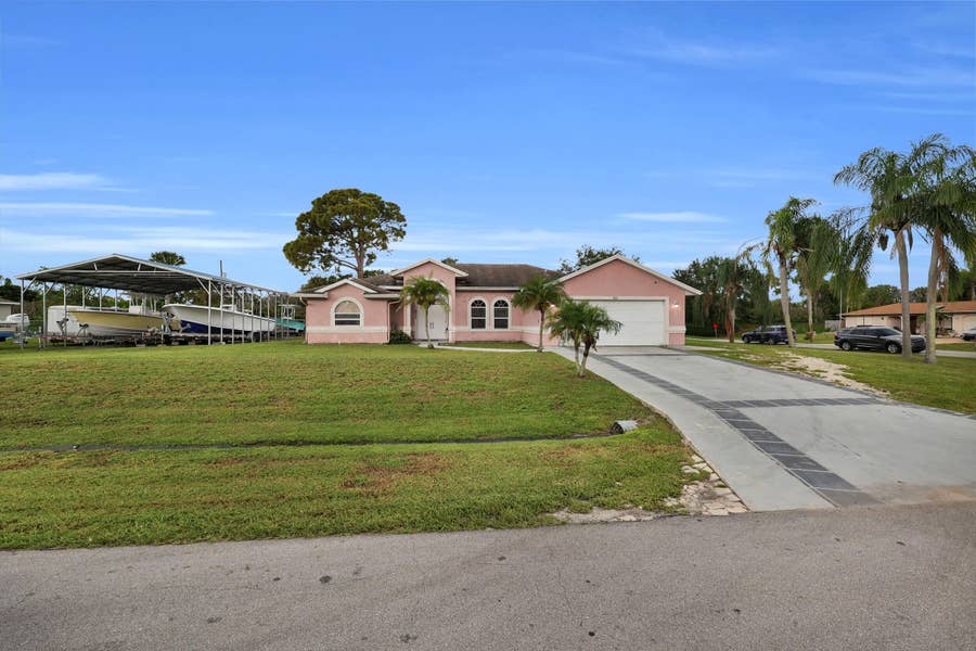 Property photo for 202 SE Grove Avenue, Port St Lucie, FL
