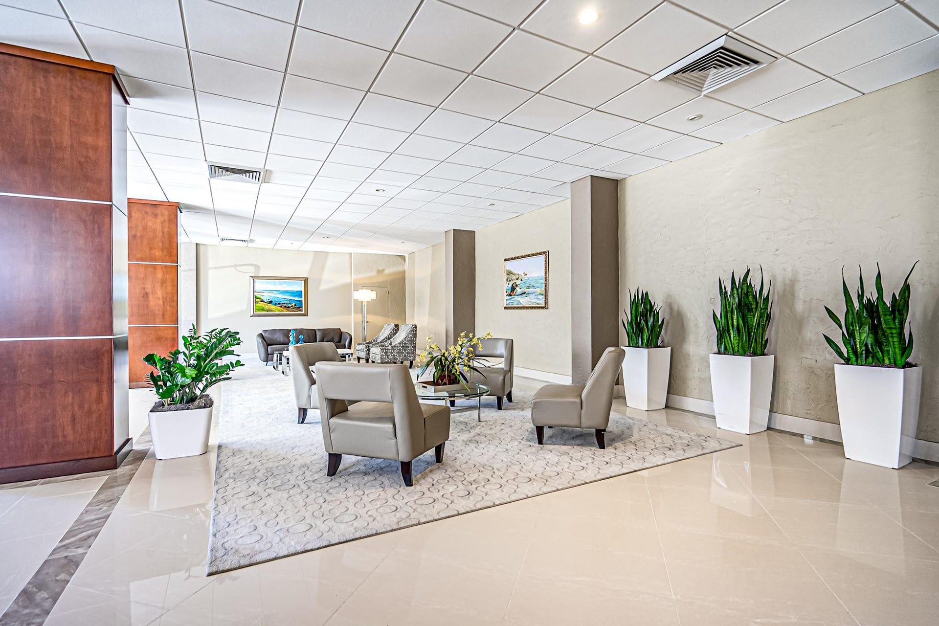 4250 GALT OCEAN Drive, #8L, Fort Lauderdale, Fort Lauderdale, FL 33308 Wood-paneled elevator, tiled flooring, textured wall finishes, recessed lighting, and a drop ceiling