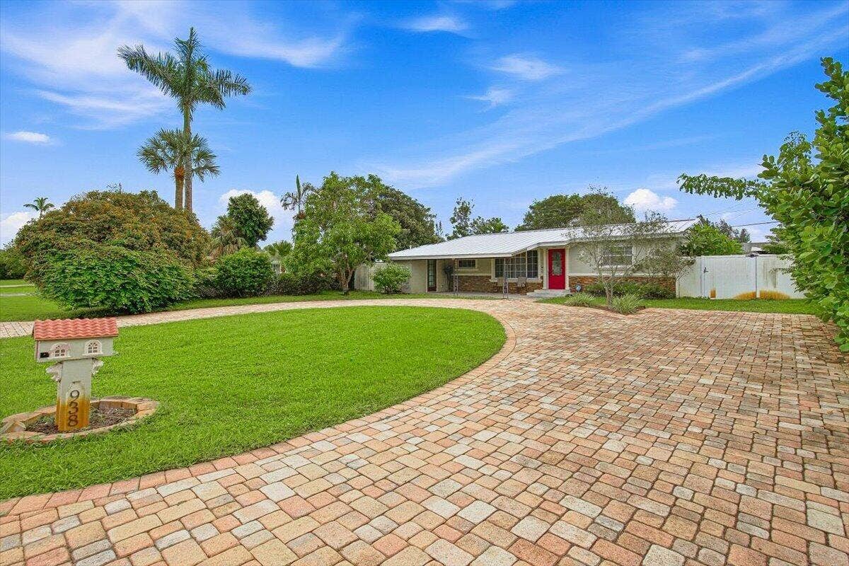 938 Arlington Drive, West Palm Beach, FL 33415 03-Front Home-C