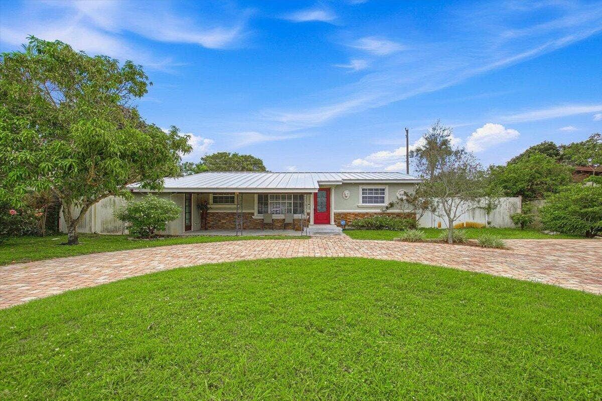 938 Arlington Drive, West Palm Beach, FL 33415 04-Front Home-D