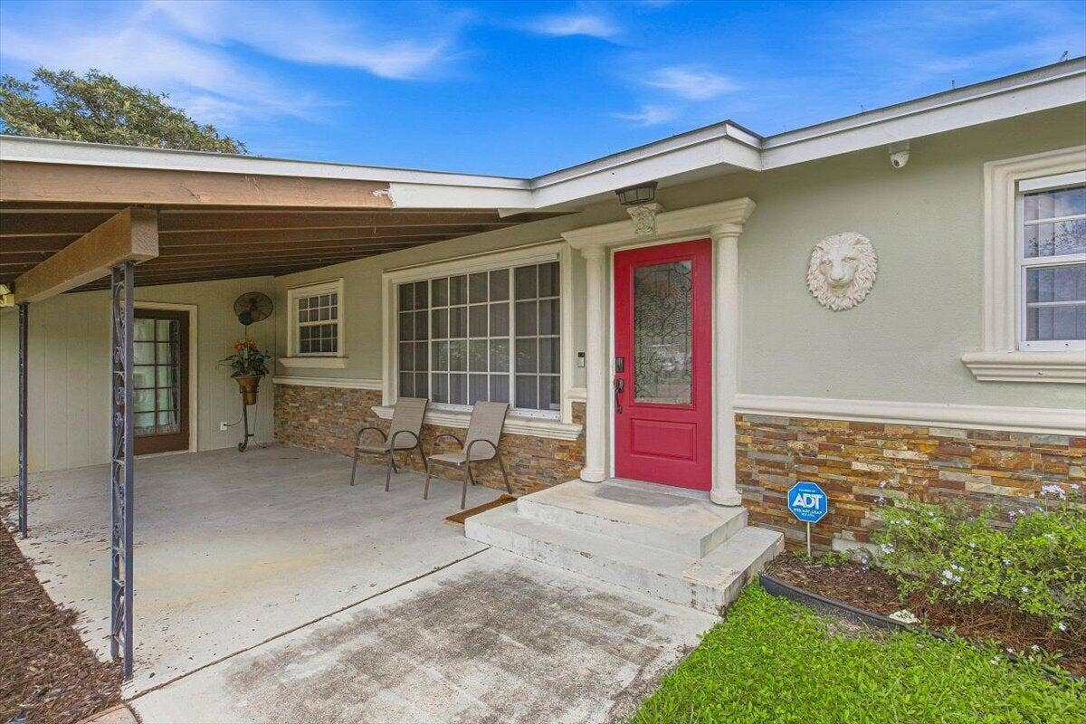 938 Arlington Drive, West Palm Beach, FL 33415 05-Front Home-E