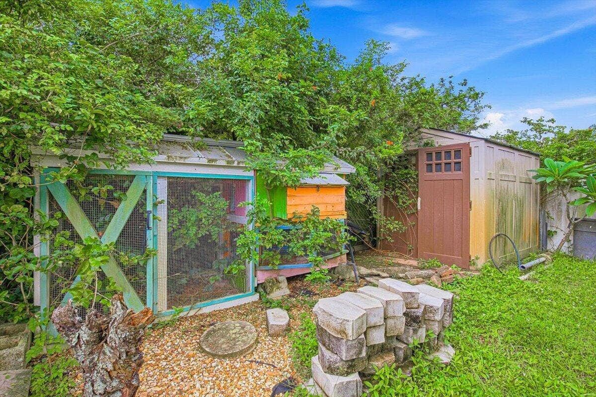 938 Arlington Drive, West Palm Beach, FL 33415 07-Backyard-Sideyard
