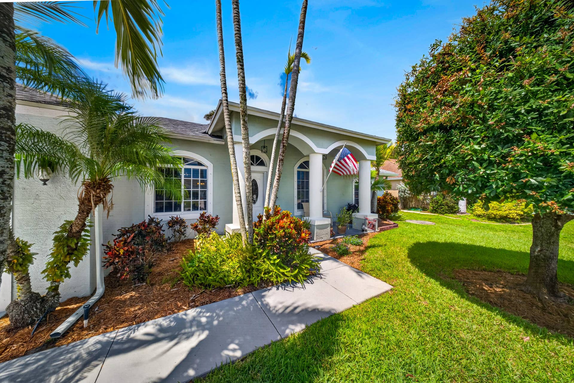 3274 SW CRUMPACKER Street, Port St Lucie, FL 34953 Front Walkway and Landscaping