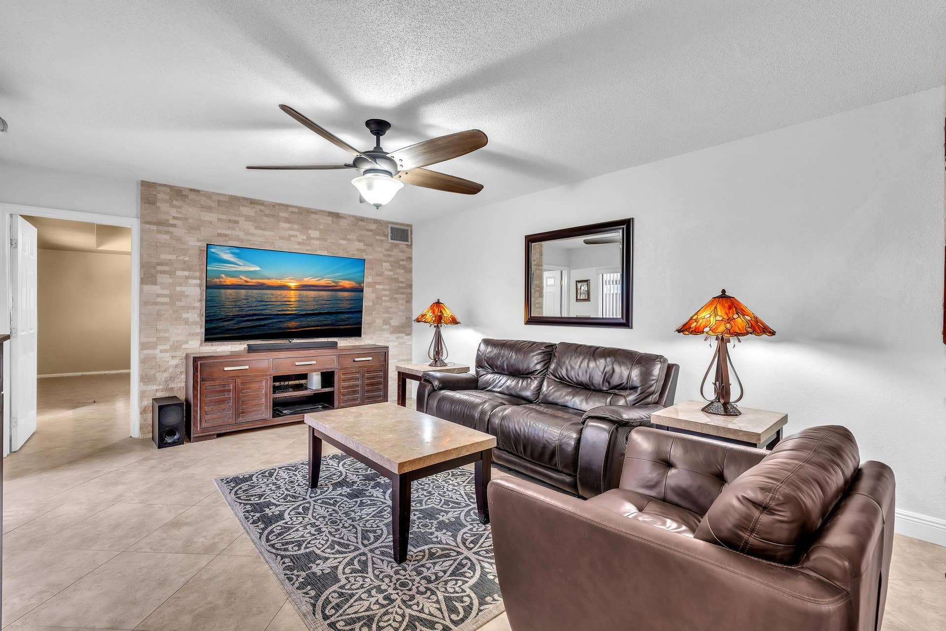 1214 SW 120TH Way, #1214, Davie, FL 33325 LIVING ROOM WITH CUSTOM STONE WALL