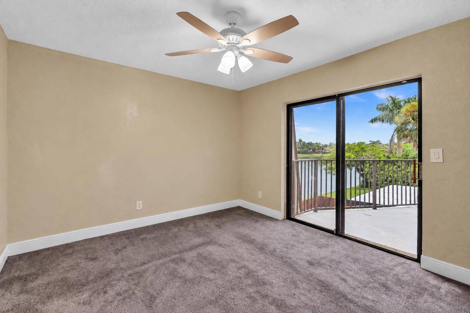 1214 SW 120TH Way, #1214, Davie, FL 33325 SECOND BEDROOM ALSO WITH SLIDING DOORS TO BALCONY OVERLOOKING BEAUTIFUL LAKE