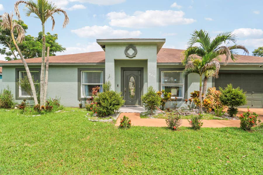 Property photo for 825 SE Cavern Avenue, Port St Lucie, FL