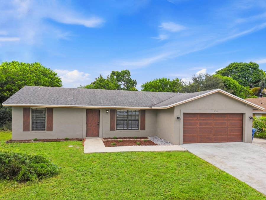 Property photo for 234 La Mancha Avenue, Royal Palm Beach, FL