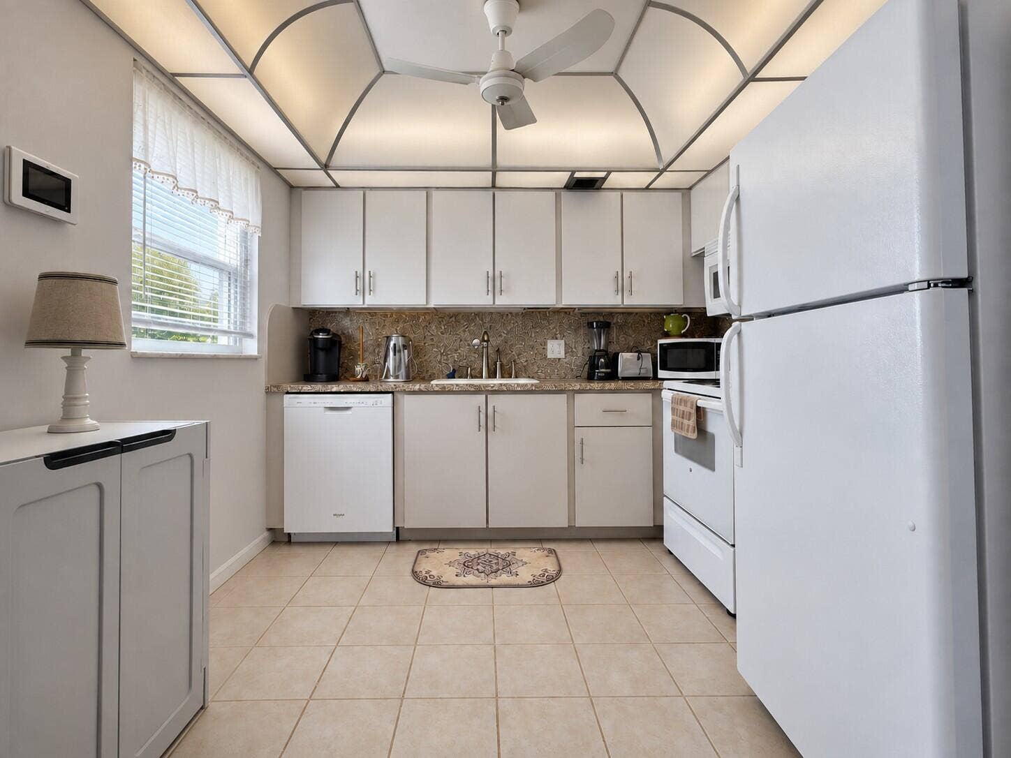 108 SOMERSET F, West Palm Beach, FL 33417 Spacious Kitchen With Updated Cabinets, Granite Look Counters, and Windo for Natural Light
