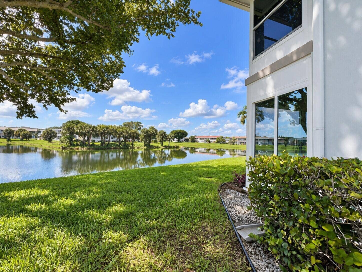 108 SOMERSET F, West Palm Beach, FL 33417 Gorgeous Setting! Pretty & Peaceful Views! CORNER 2/2 With Updated Impact Enclosed Lanai and Impact Windows (Including the Sliders)