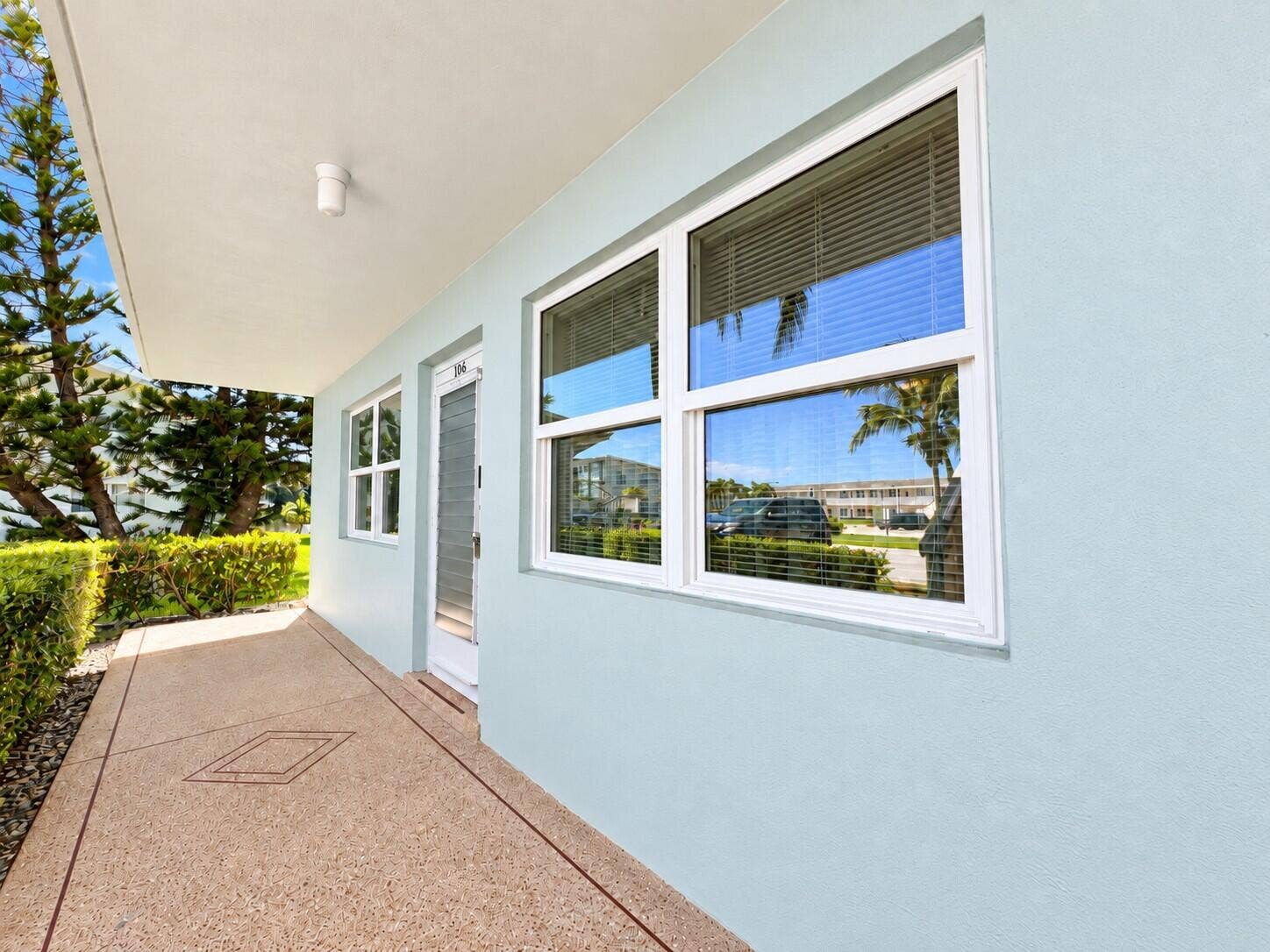 108 SOMERSET F, West Palm Beach, FL 33417 Ground Floor CORNER 2/2 With Upgraded Impact Windows Including the Two Sliders! Impact Lanai