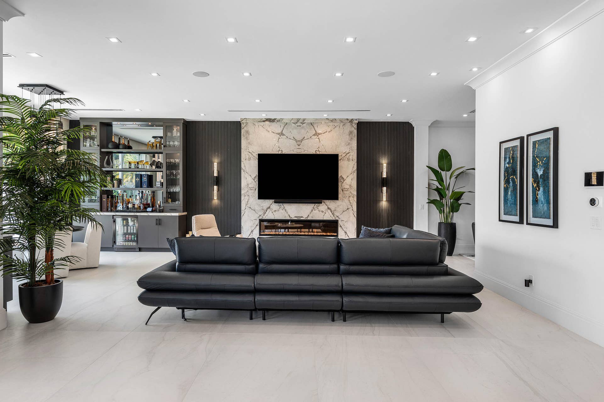 12898 S Shore Drive, Palm Beach Gardens, FL 33410 Designer Entertainment Center and Bar with glass-front cabinetry and built-in beverage cooler