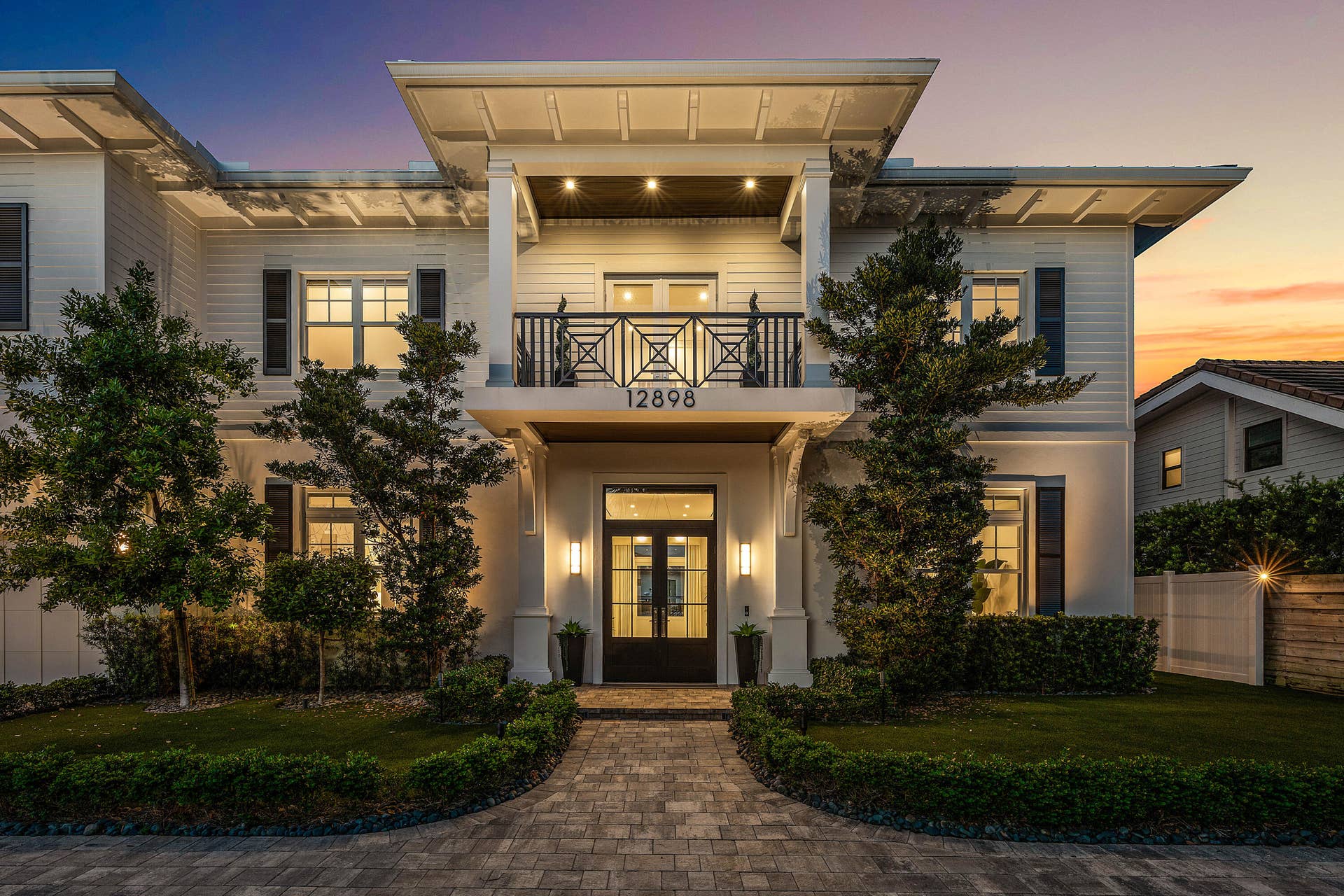 12898 S Shore Drive, Palm Beach Gardens, FL 33410 Twilight Front Entry