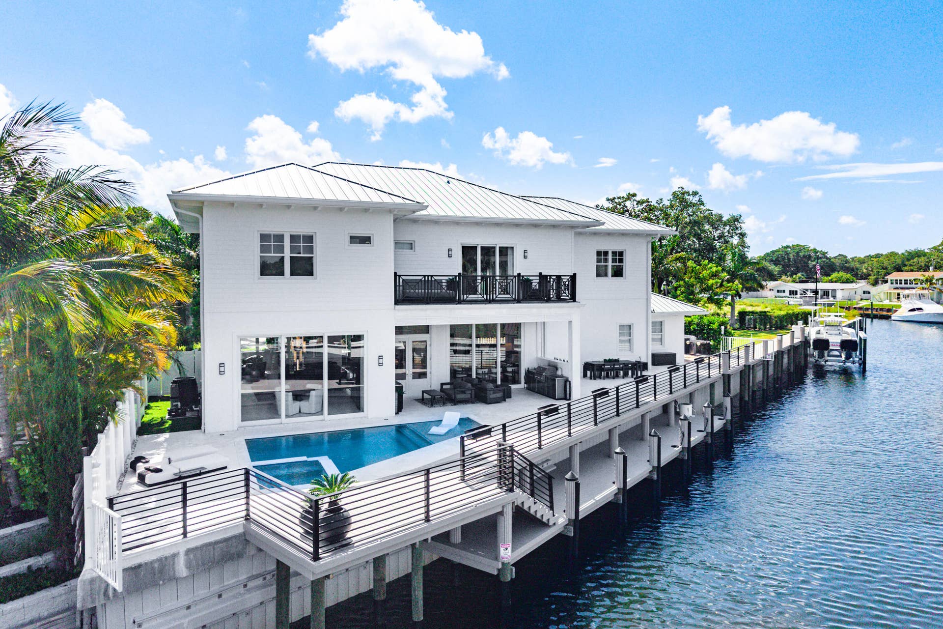 12898 S Shore Drive, Palm Beach Gardens, FL 33410 Expansive Waterfront Residence