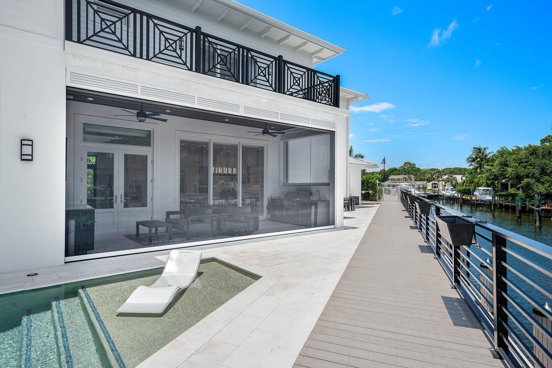 12898 S Shore Drive, Palm Beach Gardens, FL 33410 Phantom Rolldown Screens