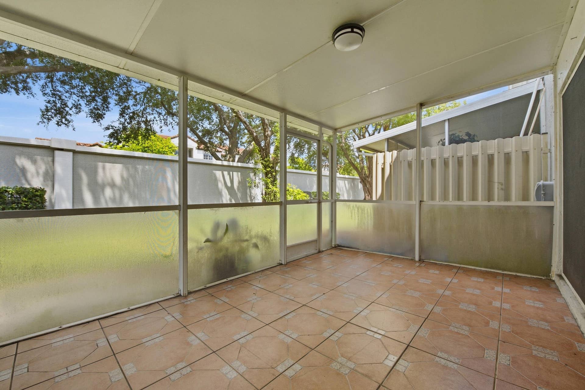 Covered, screened patio with no rear neighbors