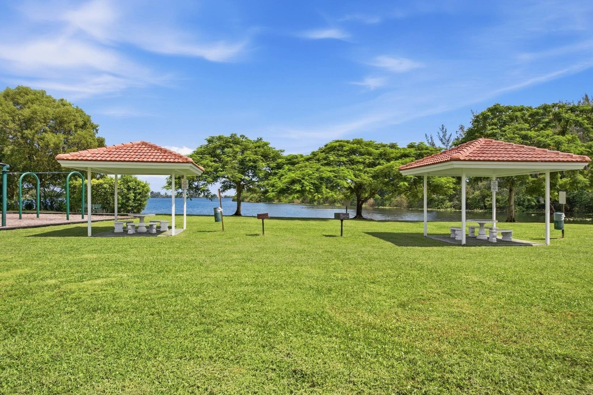 Beautifully landscaped gated Homeowners Association. Our community offers two swimming pools and playgrounds, a tennis court, basketball court, exercise room, barbeque areas, lake, and clubhouse.