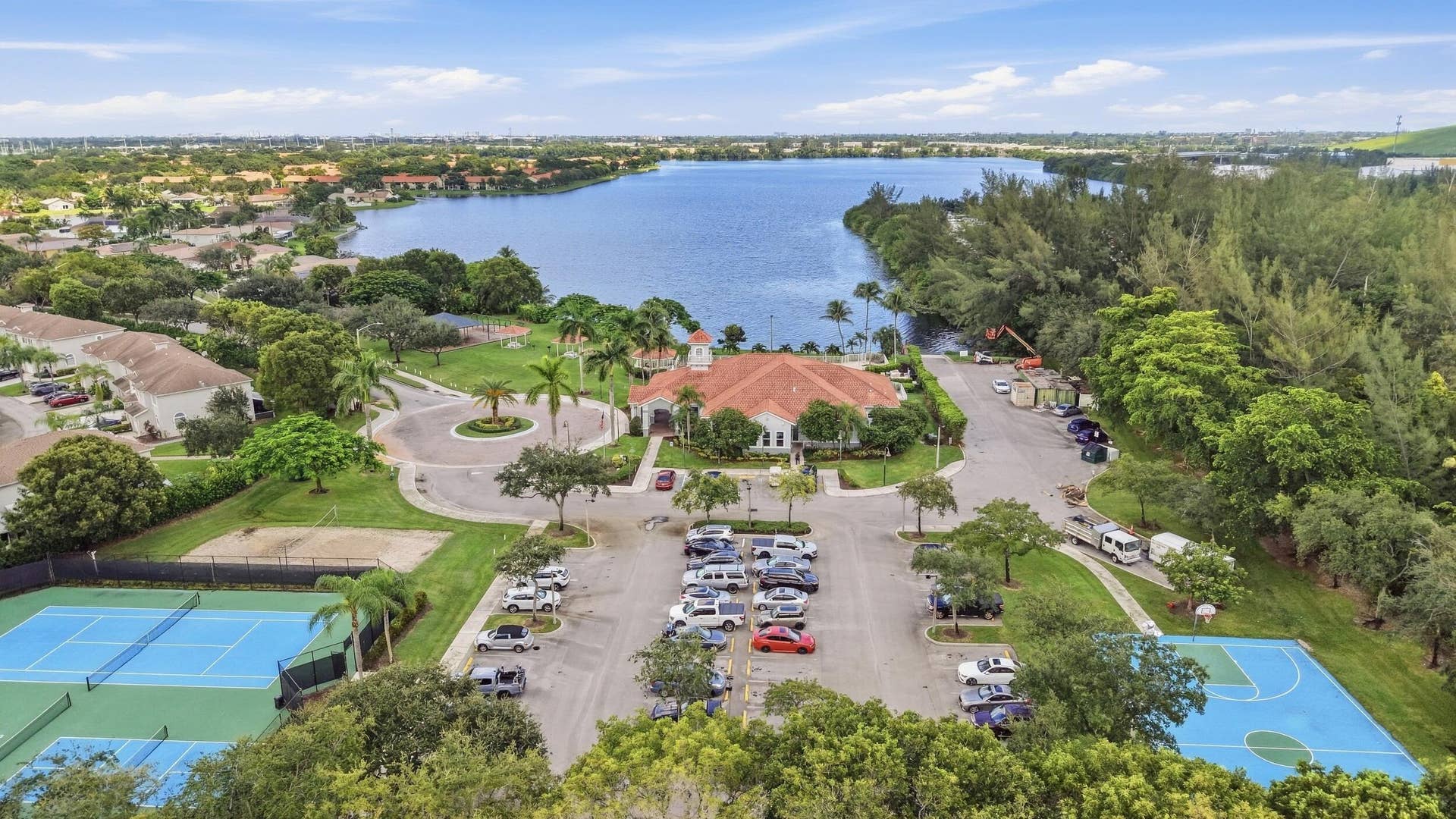Beautifully landscaped gated Homeowners Association. Our community offers two swimming pools and playgrounds, a tennis court, basketball court, exercise room, barbeque areas, lake, and clubhouse.