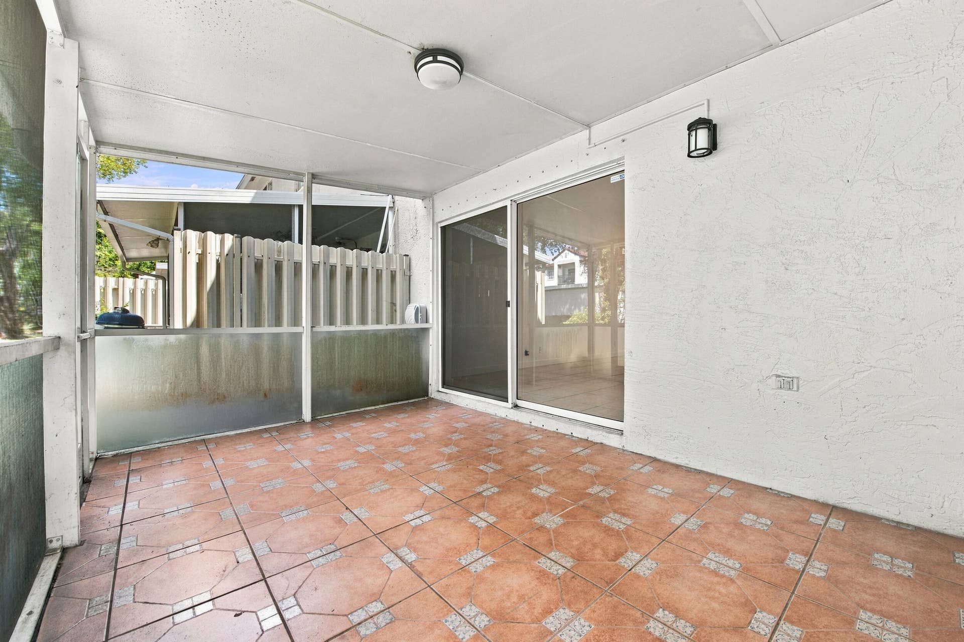 Covered, screened patio with no rear neighbors