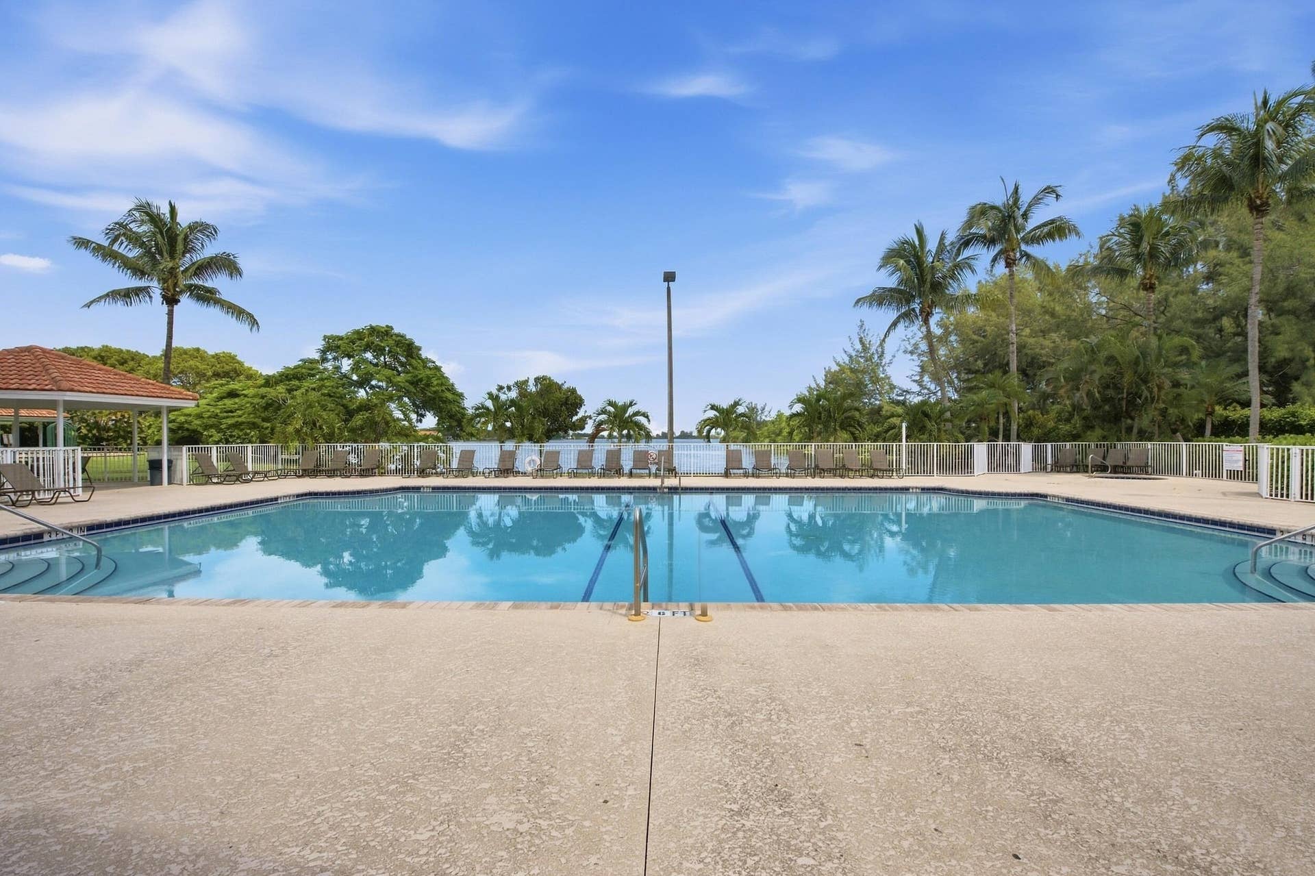 Beautifully landscaped gated Homeowners Association. Our community offers two swimming pools and playgrounds, a tennis court, basketball court, exercise room, barbeque areas, lake, and clubhouse.
