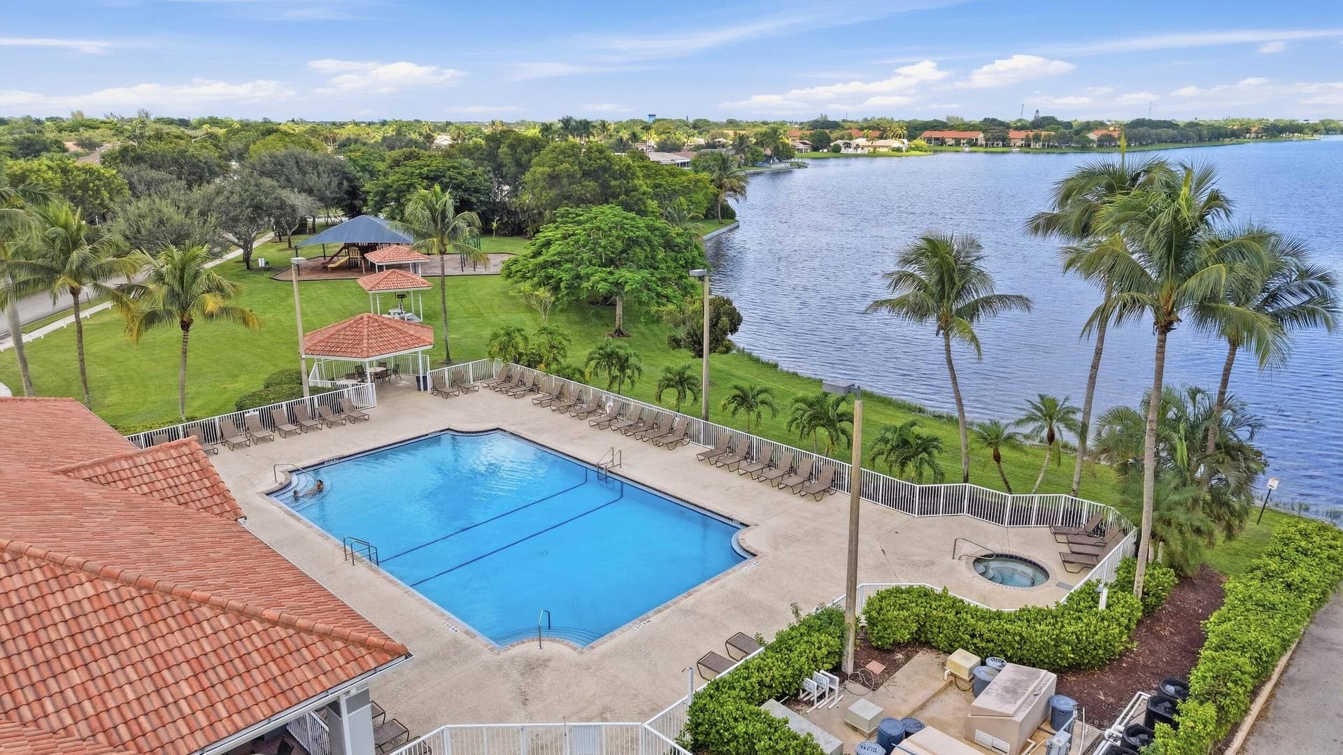 Beautifully landscaped gated Homeowners Association. Our community offers two swimming pools and playgrounds, a tennis court, basketball court, exercise room, barbeque areas, lake, and clubhouse.