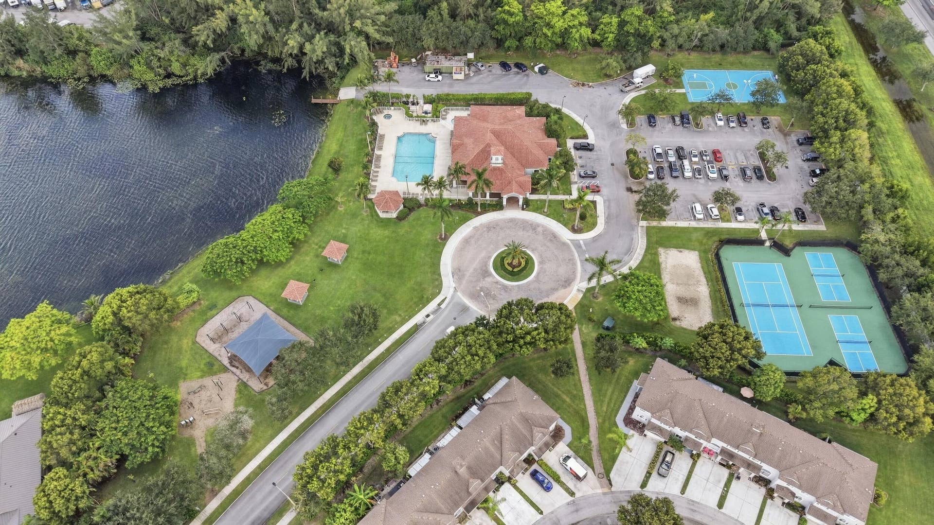 Beautifully landscaped gated Homeowners Association. Our community offers two swimming pools and playgrounds, a tennis court, basketball court, exercise room, barbeque areas, lake, and clubhouse.