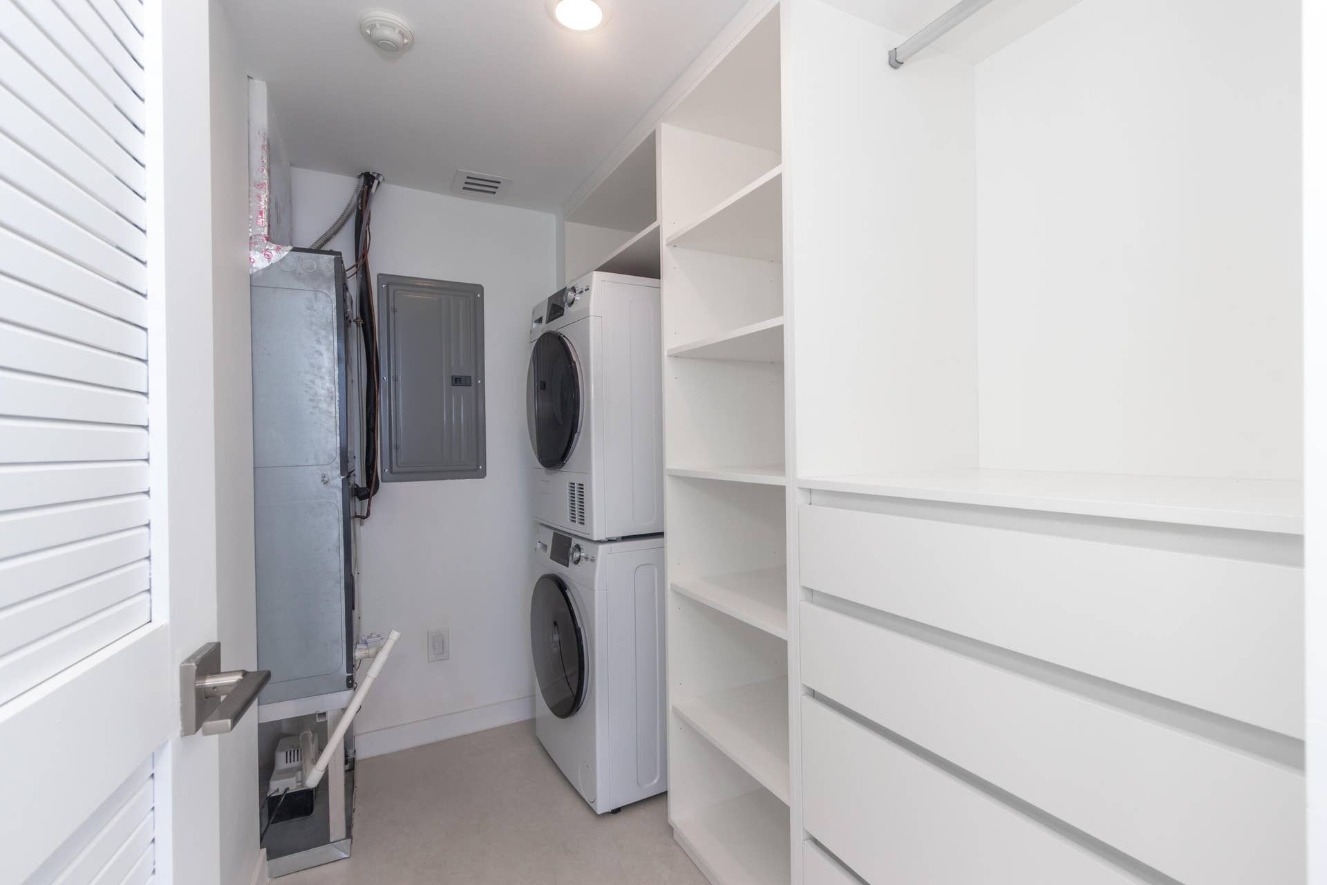 Guest bedroom closet with laundry