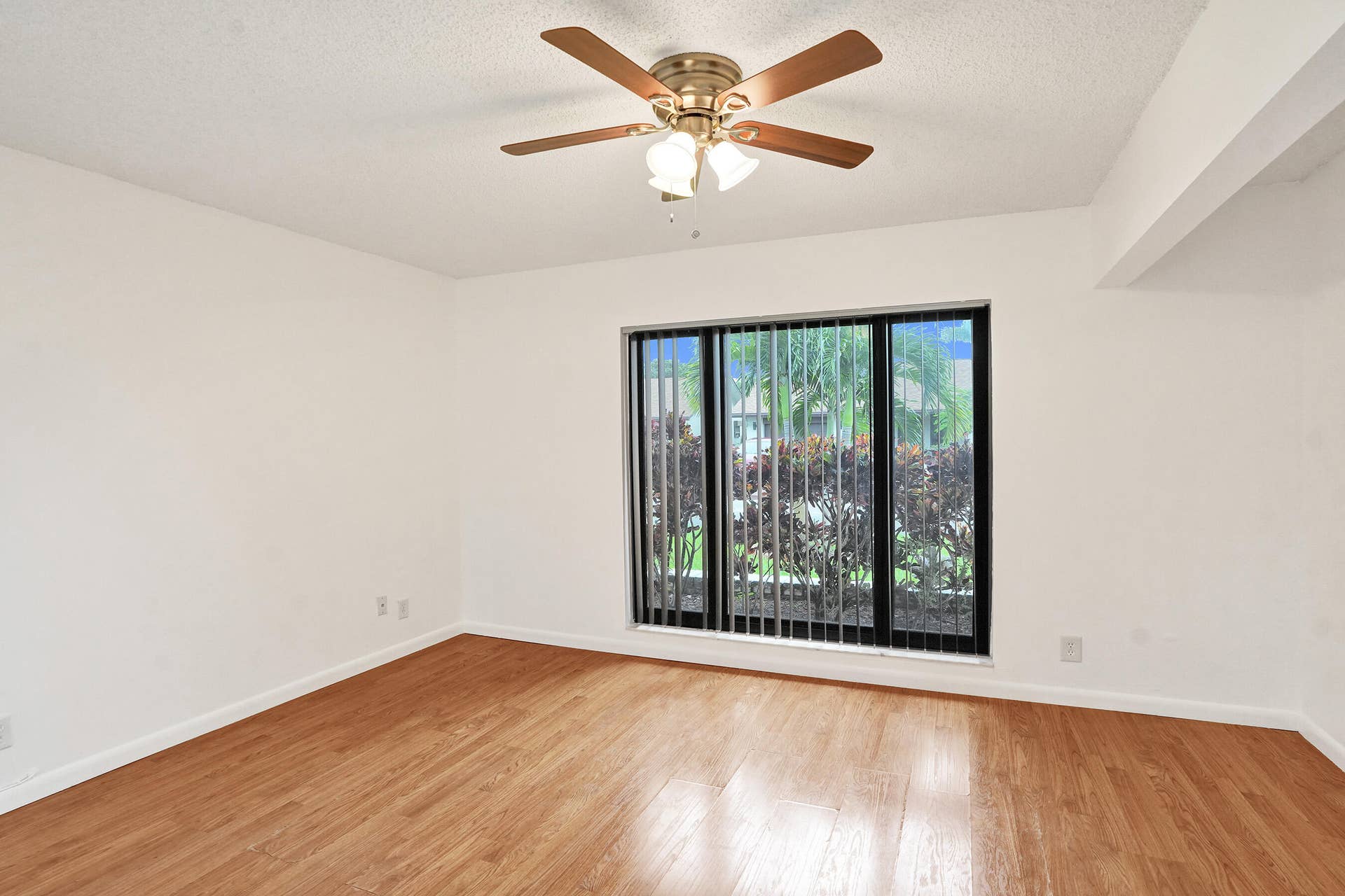 Wood-finish flooring with white walls